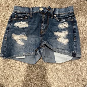 blue ripped jean shorts